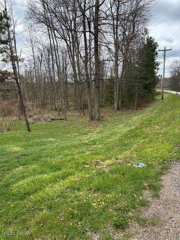5.63 Acres of Residential Land with Home for Sale in Lore City, Ohio
