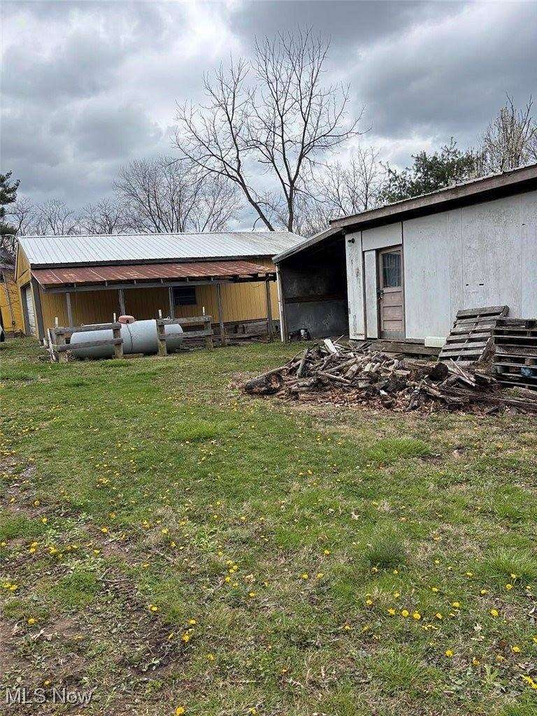 5.63 Acres of Residential Land with Home for Sale in Lore City, Ohio