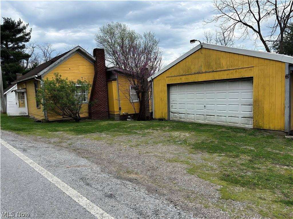 5.59 Acres of Land with Home for Sale in Lore City, Ohio