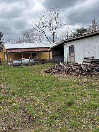 5.63 Acres of Residential Land with Home for Sale in Lore City, Ohio