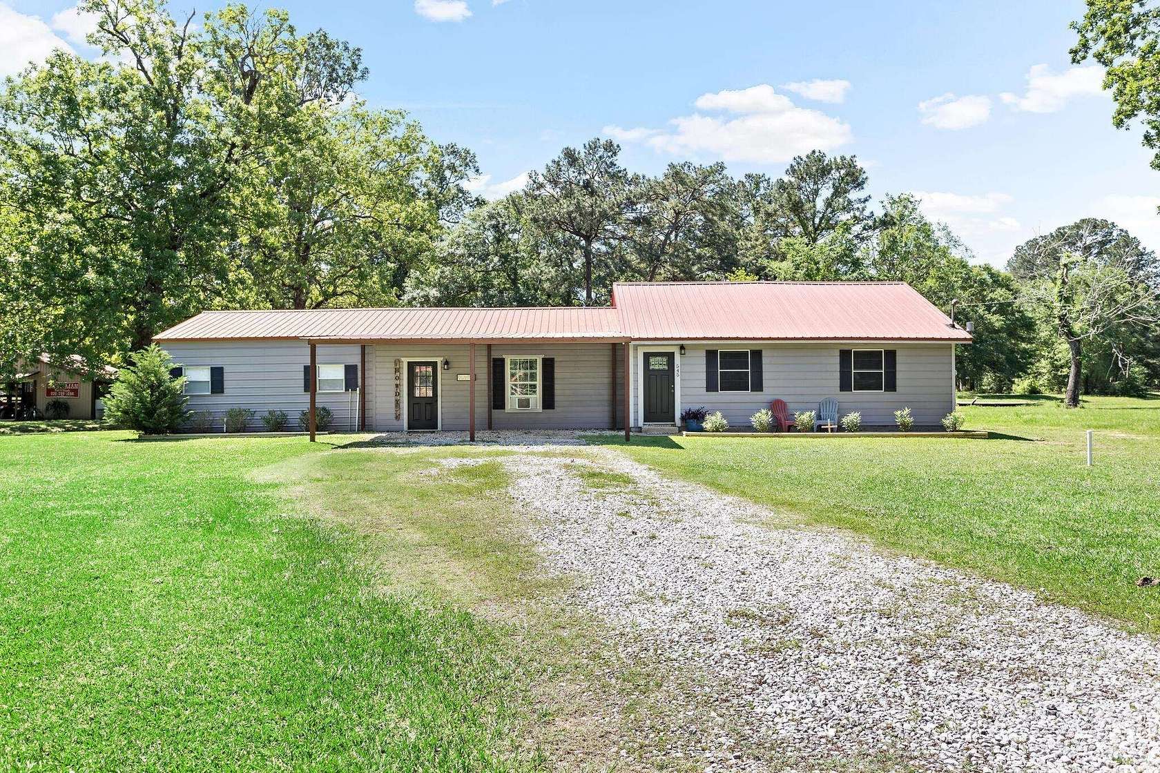 4 Acres of Residential Land with Home for Sale in Liberty, Texas