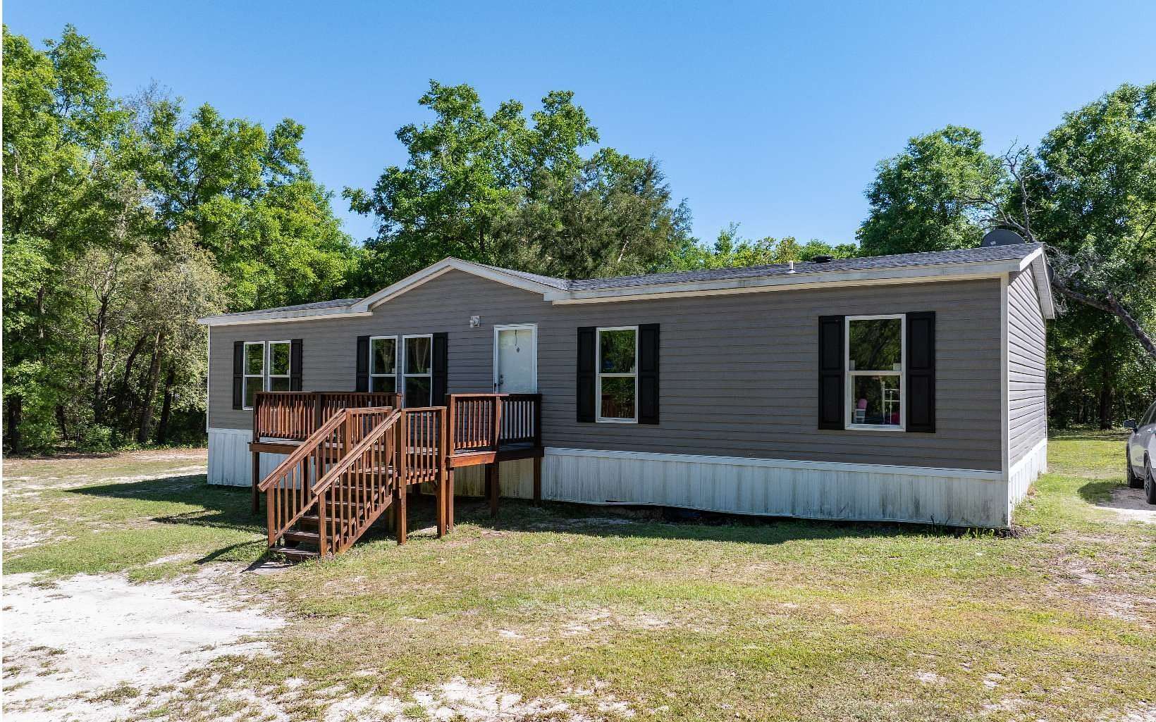 2.5 Acres of Residential Land with Home for Sale in Lake City, Florida