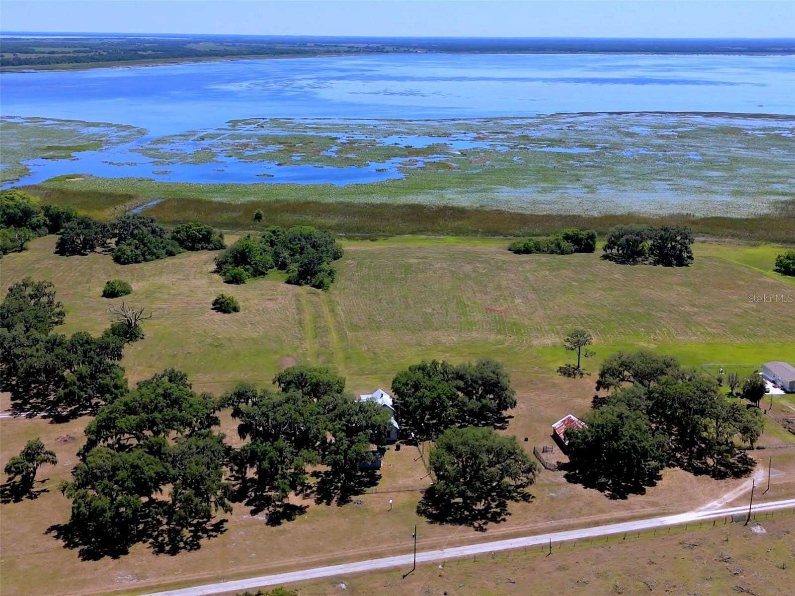 11.3 Acres of Recreational Land with Home for Sale in St. Cloud, Florida