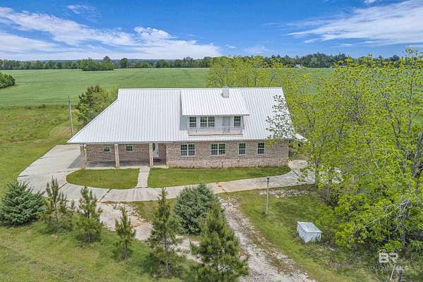 14 Acres of Land with Home for Sale in Elberta, Alabama