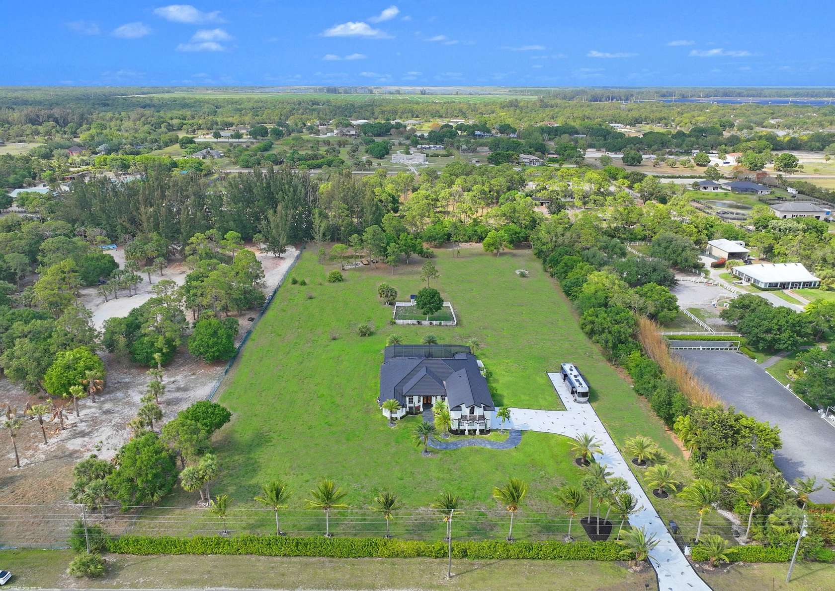 5 Acres of Land with Home for Sale in The Acreage, Florida