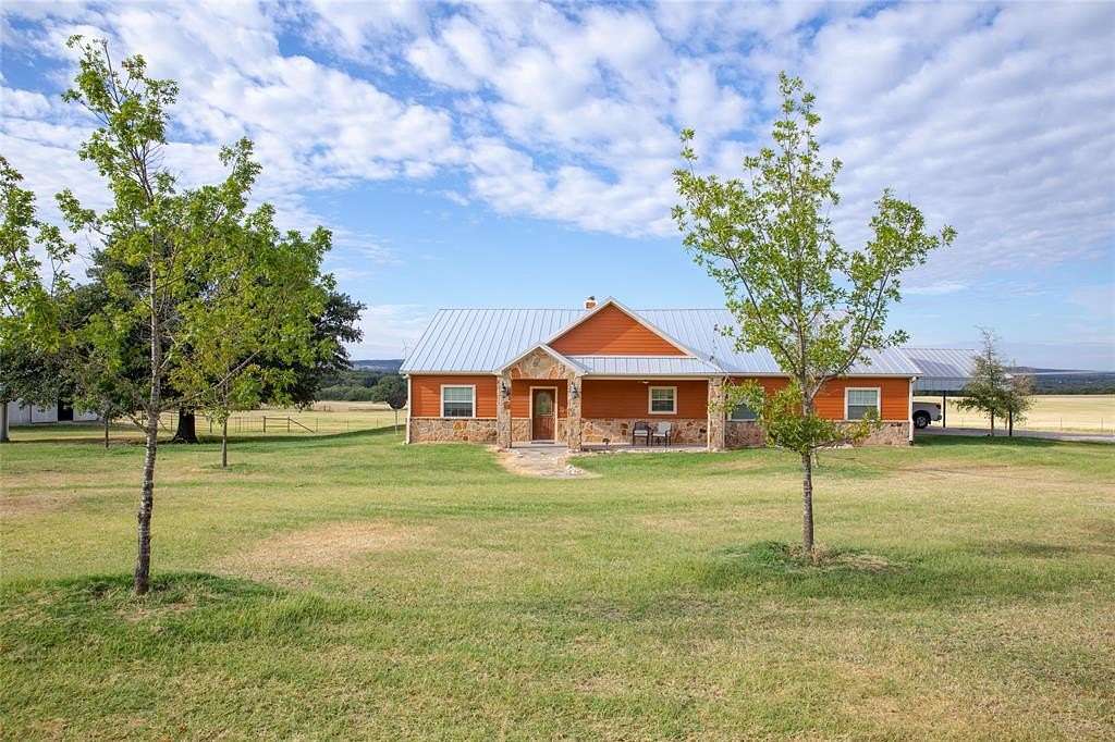 97.2 Acres of Agricultural Land with Home for Sale in Stephenville, Texas