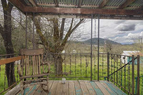 4.14 Acres of Residential Land with Home for Sale in Cave Junction, Oregon