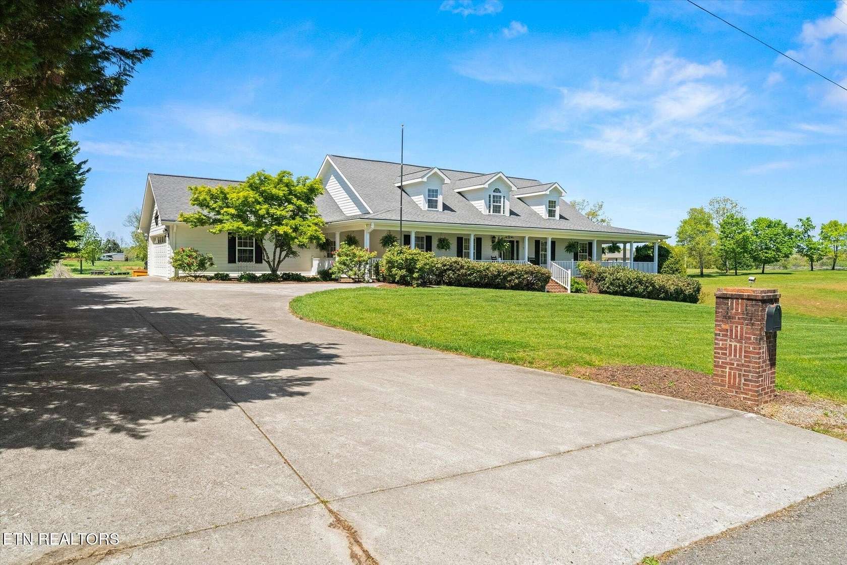 4.9 Acres of Residential Land with Home for Sale in Madisonville, Tennessee