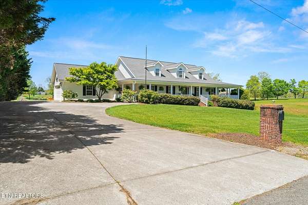 4.9 Acres of Residential Land with Home for Sale in Madisonville, Tennessee