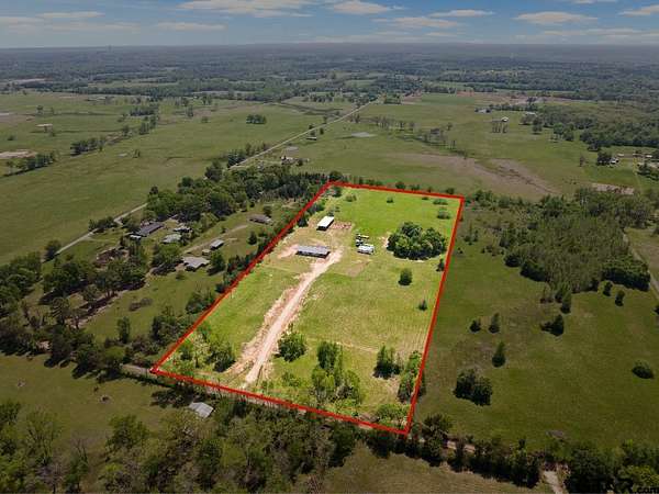 12.7 Acres of Land with Home for Sale in Mount Pleasant, Texas
