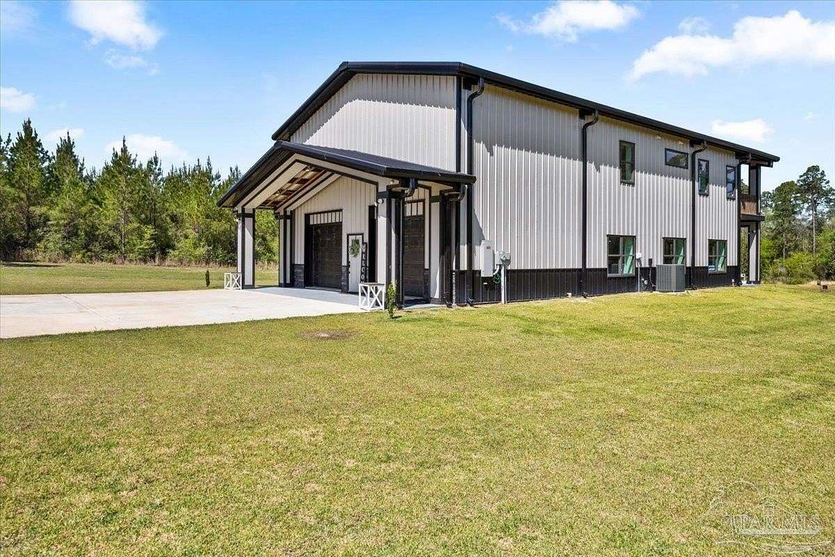 15 Acres of Land with Home for Sale in Pace, Florida