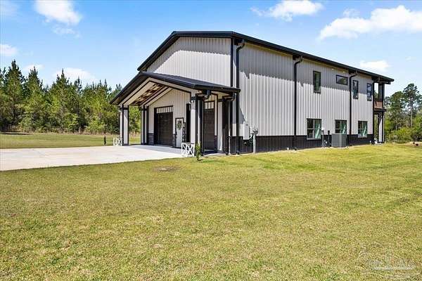 15 Acres of Land with Home for Sale in Pace, Florida