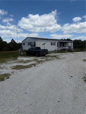 5 Acres of Land with Home for Sale in Punta Gorda, Florida