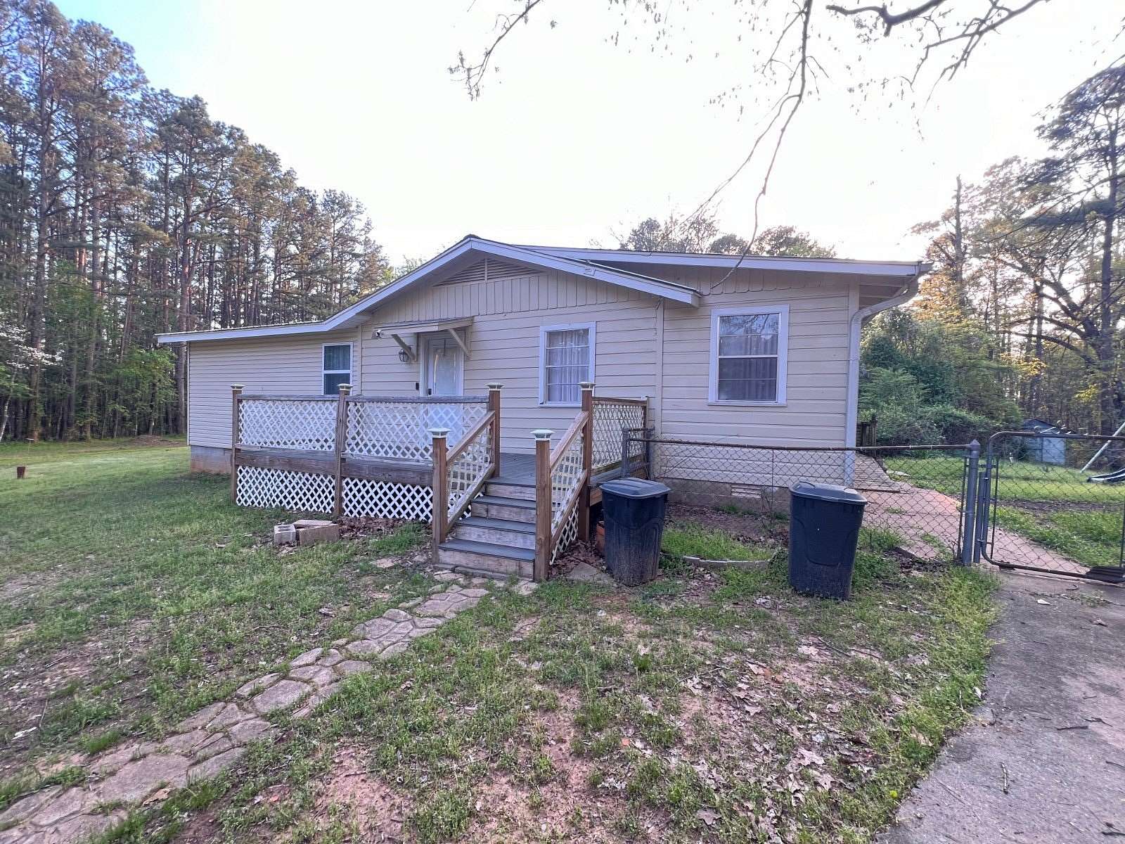 5.75 Acres of Land with Home for Sale in New Blaine, Arkansas