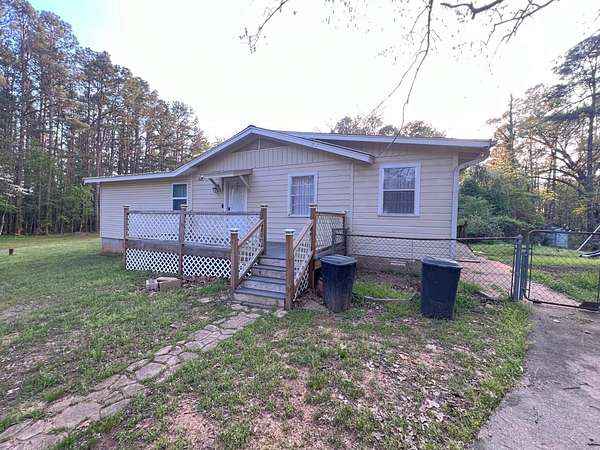 5.75 Acres of Residential Land with Home for Sale in New Blaine, Arkansas