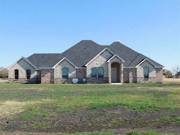 1.69 Acres of Residential Land with Home for Sale in Terrell, Texas