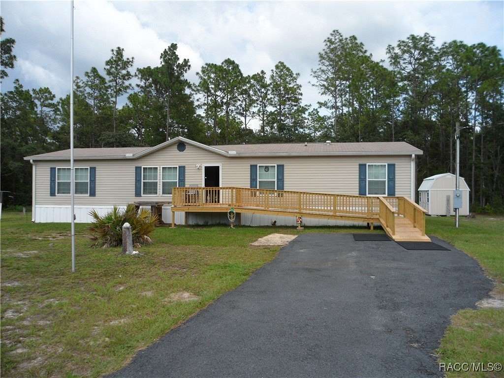 1.85 Acres of Residential Land with Home for Sale in Homosassa, Florida