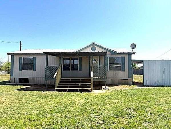 1.69 Acres of Residential Land with Home for Sale in Merkel, Texas