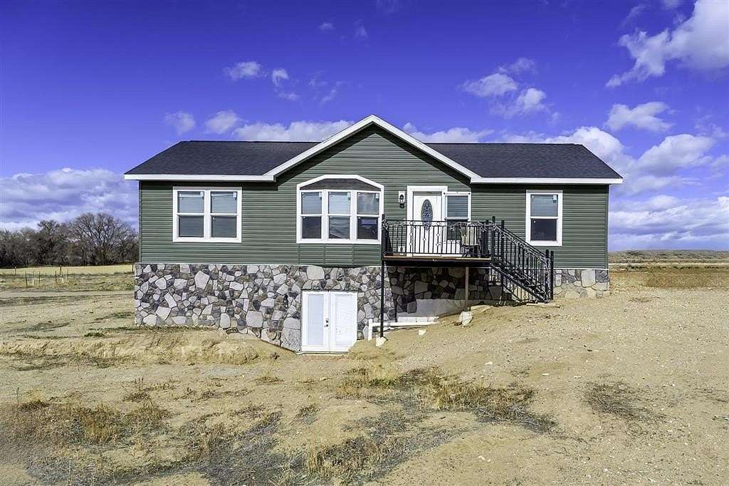 1.69 Acres of Land with Home for Sale in Powell, Wyoming