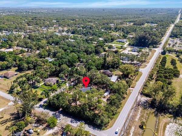 1.59 Acres of Residential Land with Home for Sale in The Acreage, Florida