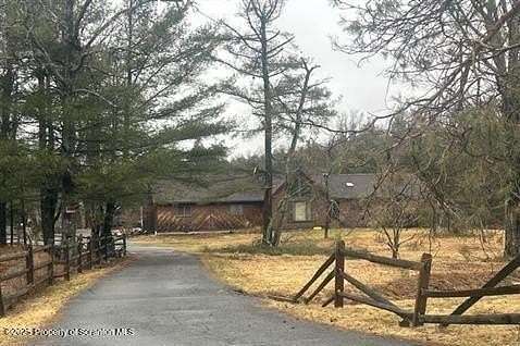1.63 Acres of Residential Land with Home for Sale in Spring Brook Township, Pennsylvania