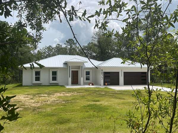 1.54 Acres of Residential Land with Home for Sale in Ocala, Florida