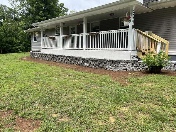 1.55 Acres of Residential Land with Home for Sale in White Pine, Tennessee