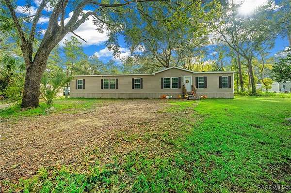 1.62 Acres of Residential Land with Home for Sale in Fort McCoy, Florida