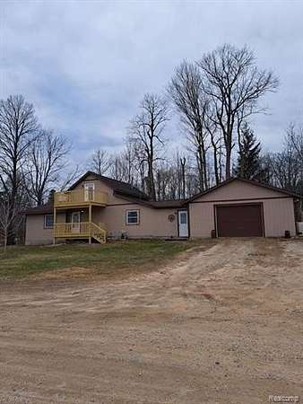1.8 Acres of Residential Land with Home for Sale in West Branch, Michigan