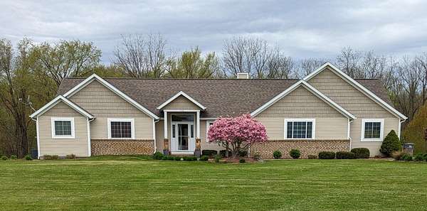 1.8 Acres of Residential Land with Home for Sale in Lowell, Michigan