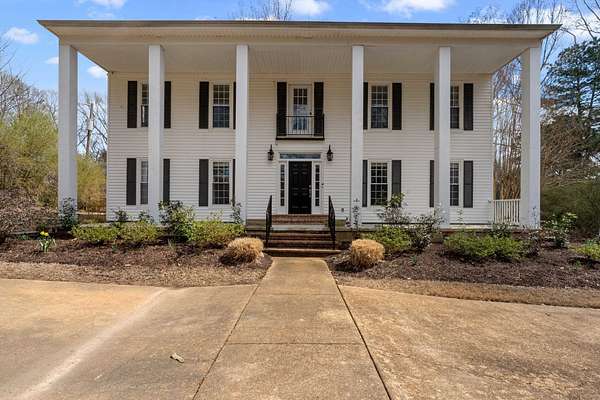 1.7 Acres of Residential Land with Home for Sale in Piperton, Tennessee