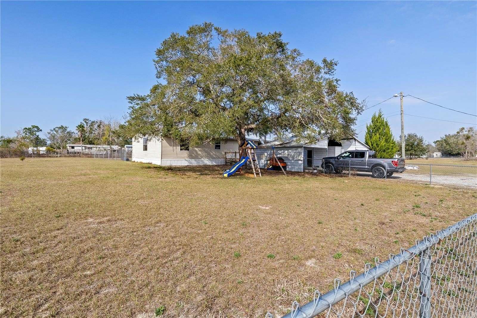 1.5 Acres of Residential Land with Home for Sale in Belleview, Florida