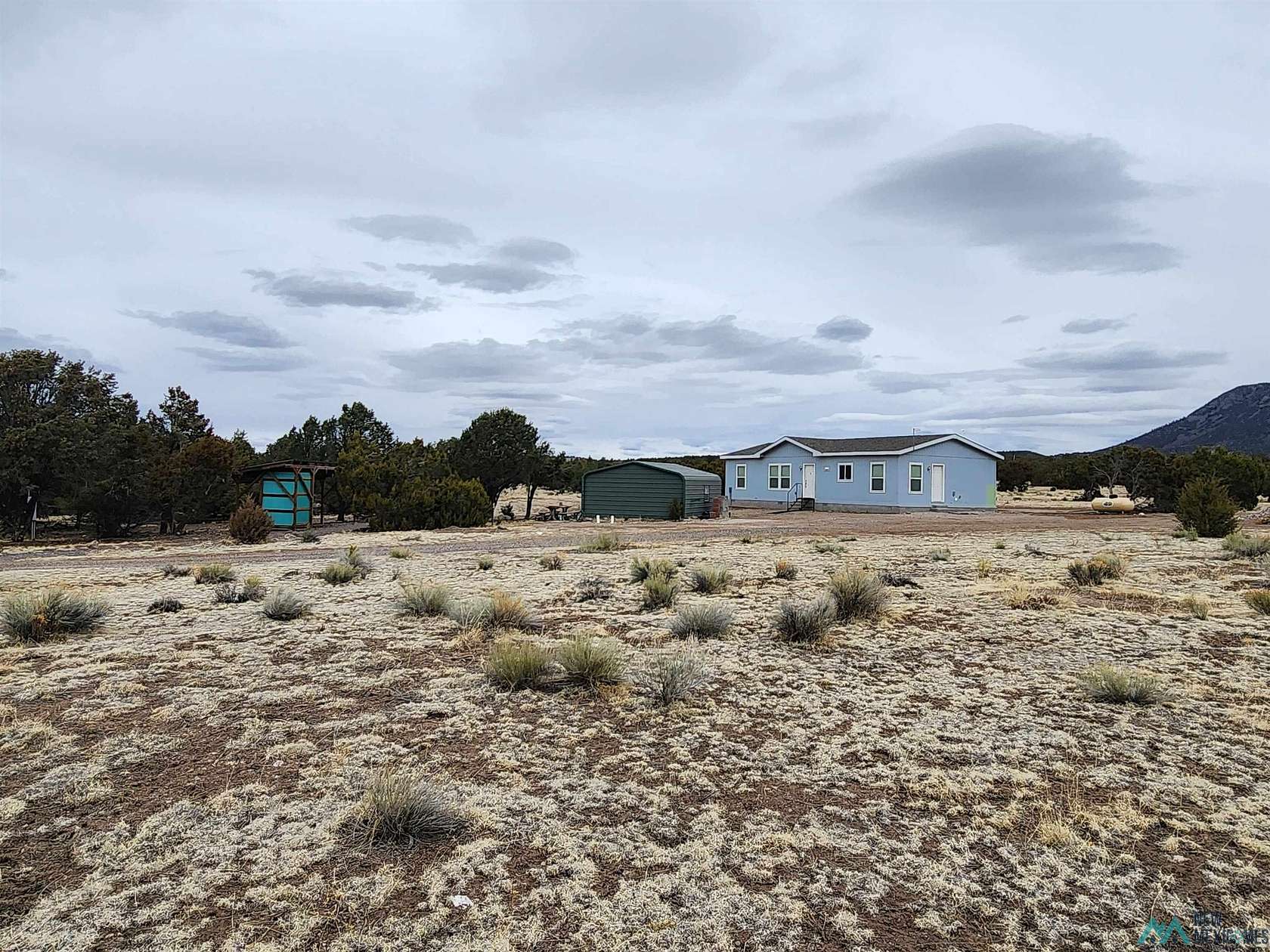1.5 Acres of Residential Land with Home for Sale in Quemado, New Mexico