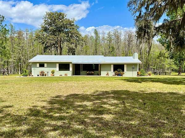 10.5 Acres of Land with Home for Sale in Groveland, Florida