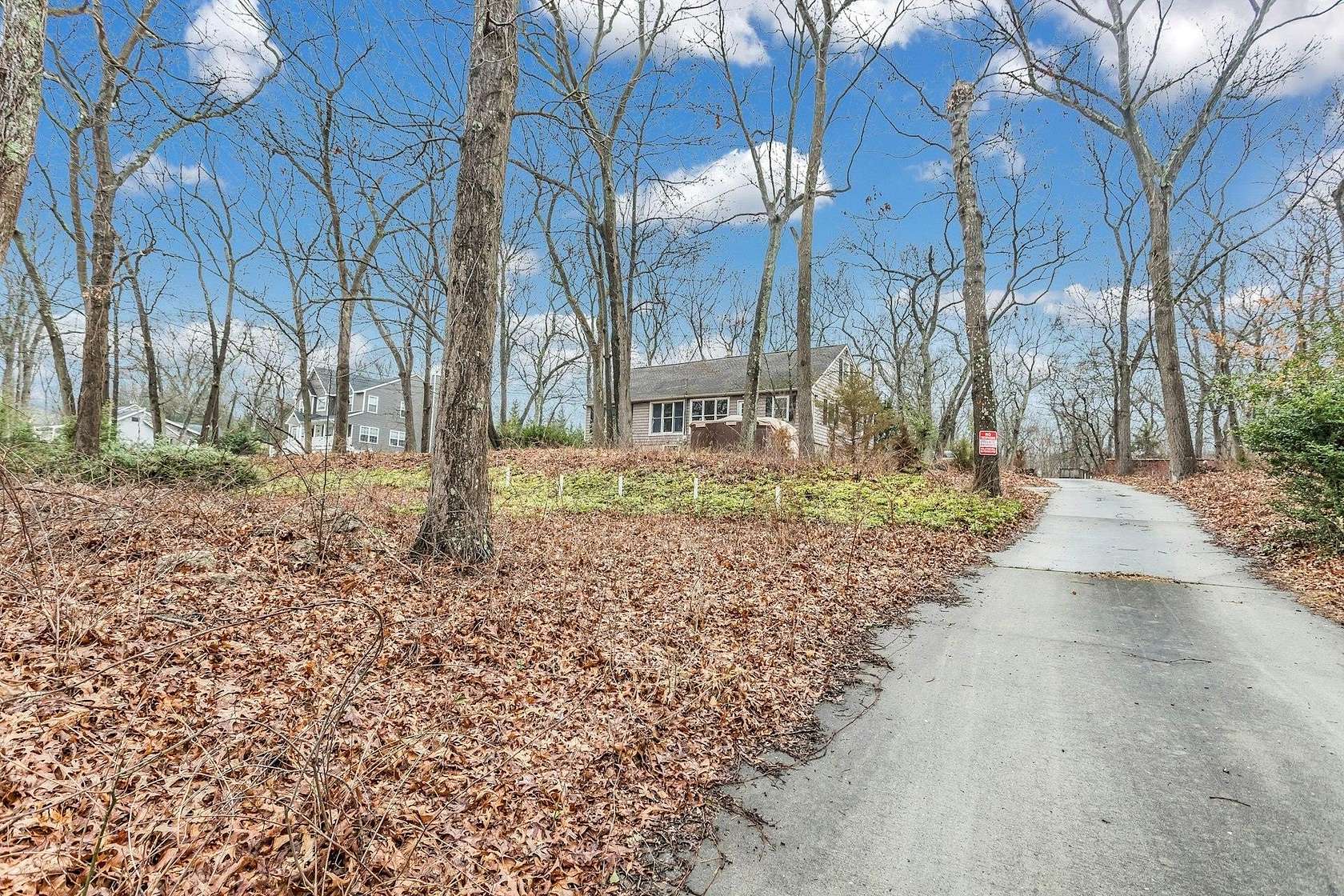 1.54 Acres of Residential Land with Home for Sale in Smithtown, New York