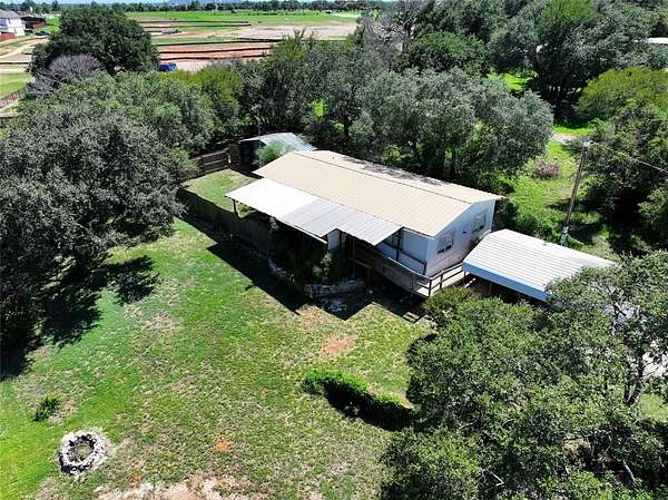 1.77 Acres of Residential Land with Home for Sale in Granbury, Texas