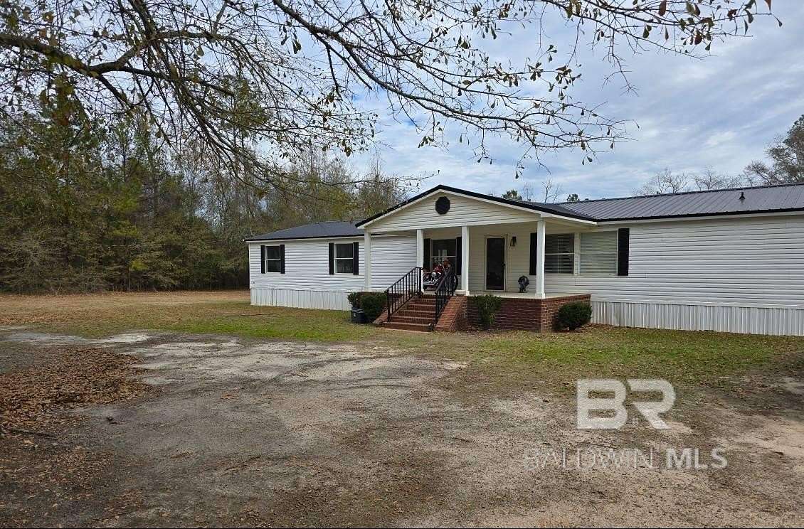 1.55 Acres of Residential Land with Home for Sale in Monroeville, Alabama