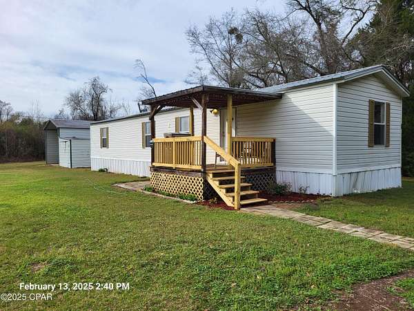 1.5 Acres of Residential Land with Home for Sale in Cottondale, Florida