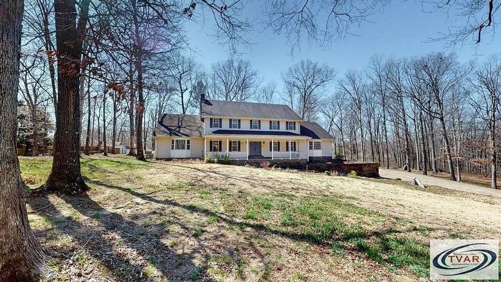 1.6 Acres of Residential Land with Home for Sale in Paris, Tennessee