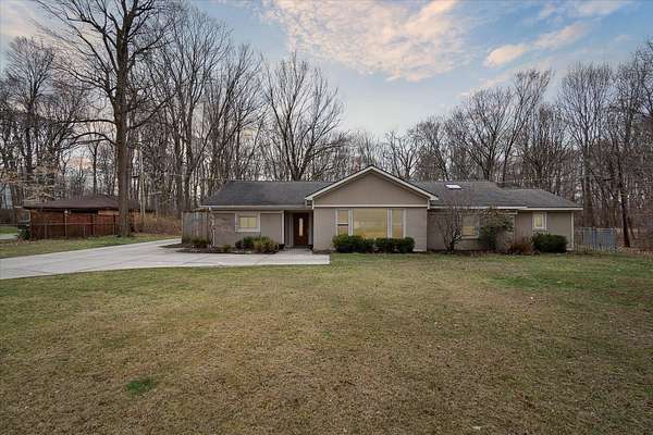1.5 Acres of Residential Land with Home for Sale in Farmington, Michigan