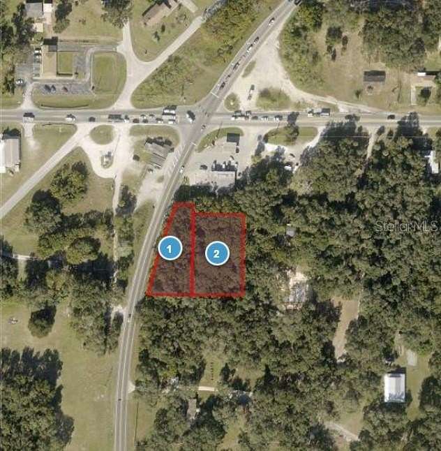 0.98 Acres of Commercial Land for Sale in Okahumpka, Florida
