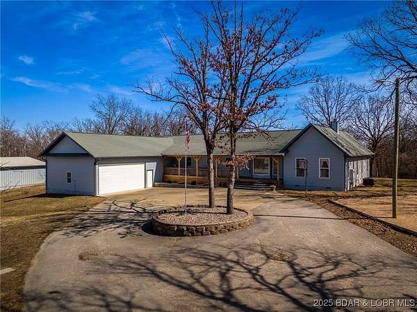 27.8 Acres of Recreational Land with Home for Sale in Gravois Mills, Missouri