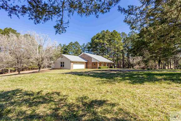 10.8 Acres of Land with Home for Sale in Avery, Texas