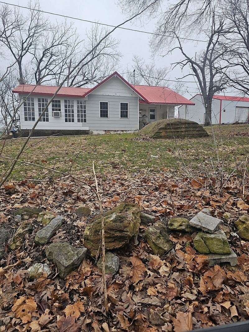 80 Acres of Agricultural Land with Home for Sale in Clever, Missouri