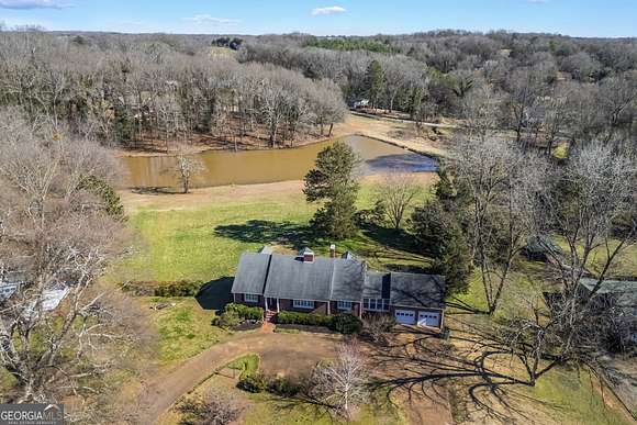 7.53 Acres of Land with Home for Sale in Carnesville, Georgia