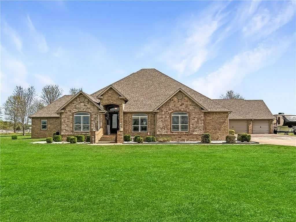 11.5 Acres of Land with Home for Sale in Farmington, Arkansas