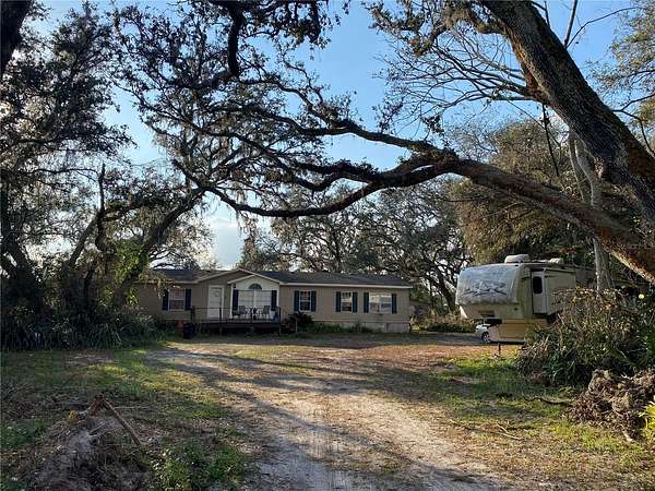 2.5 Acres of Residential Land with Home for Sale in Zephyrhills, Florida