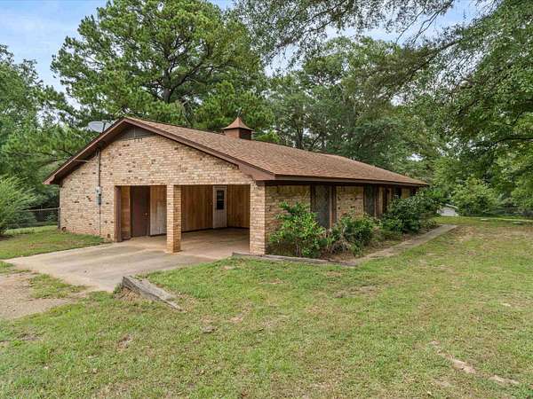 5.88 Acres of Residential Land with Home for Sale in Daingerfield, Texas