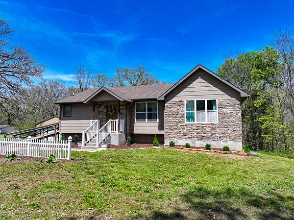 89.8 Acres of Recreational Land with Home for Sale in Collins, Missouri