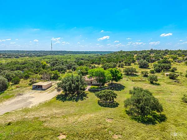 10 Acres of Residential Land with Home for Sale in Sonora, Texas
